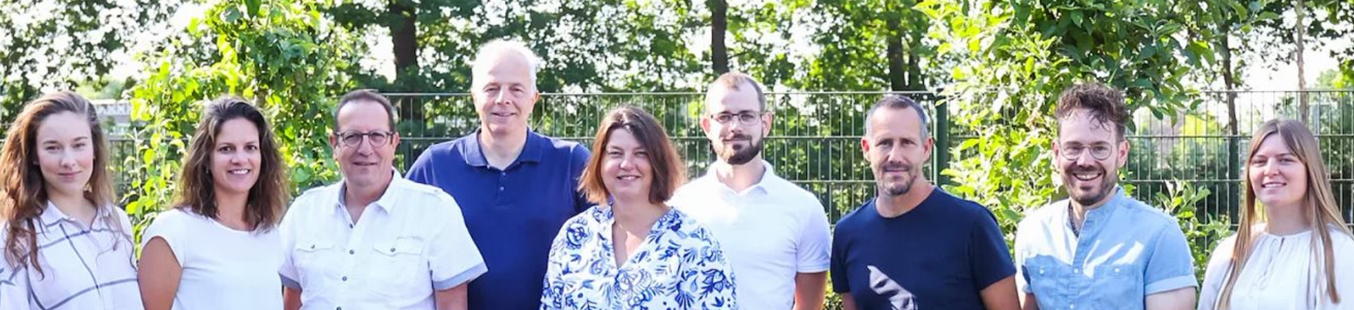 Groepsfoto van de docenten en betrokkenen rondom het praktoraat dierwelzijn en gezondheid.